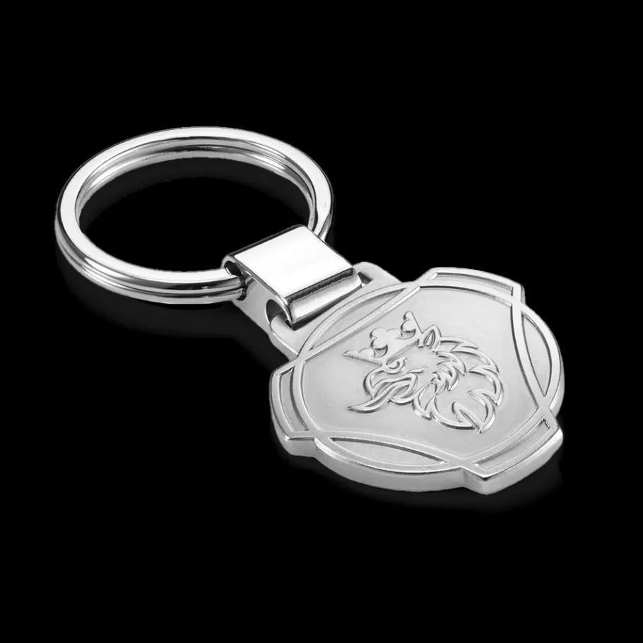 scaniasymbolnyckelring_i_metall_0.webp Scania Nyckelringar | -symbolnyckelring i metall